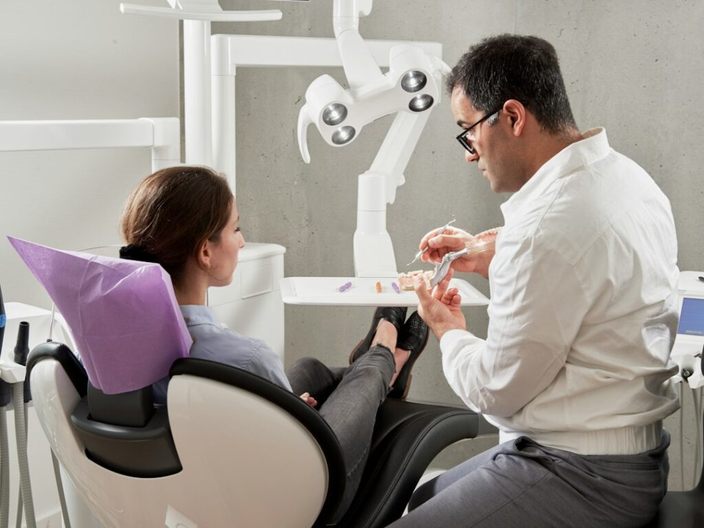 patient discussing preventive dental care with a dentist